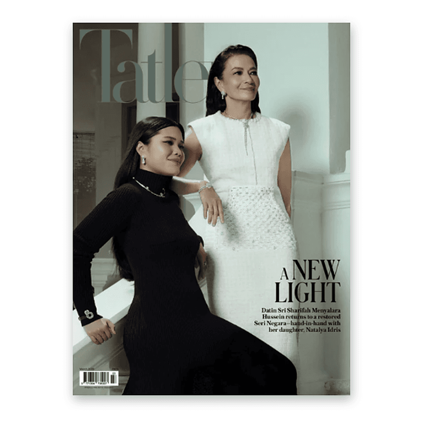 Tatler magazine cover with two women, one seated and one standing.